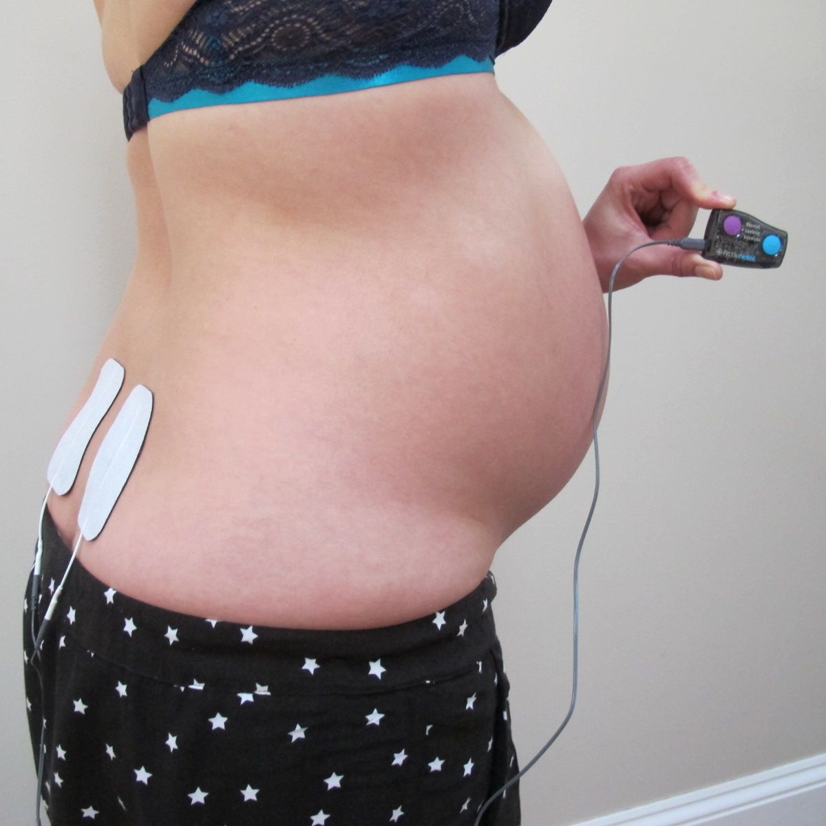 Kid Using Tens Machine How to Use a TENS Machine in Labour | Nourish Baby – Nourish Baby Online