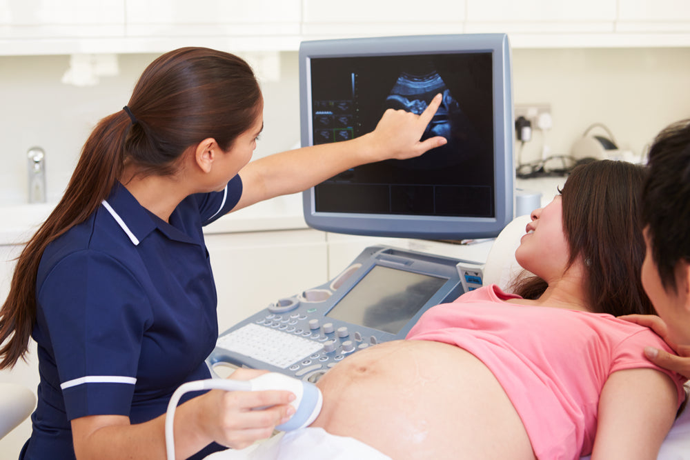Woman receiving a pregnancy ultrasound scan | Nourish Baby