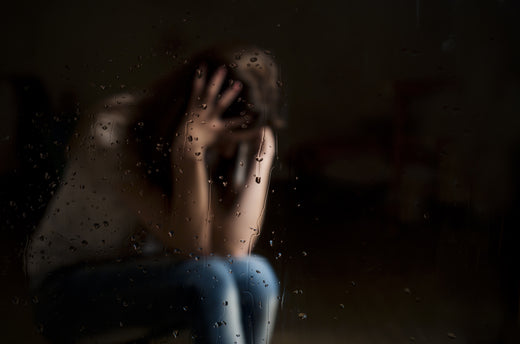 Sad women who has experienced birth trauma | Nourish Baby