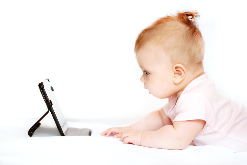 Baby watching an iPad | Nourish Baby