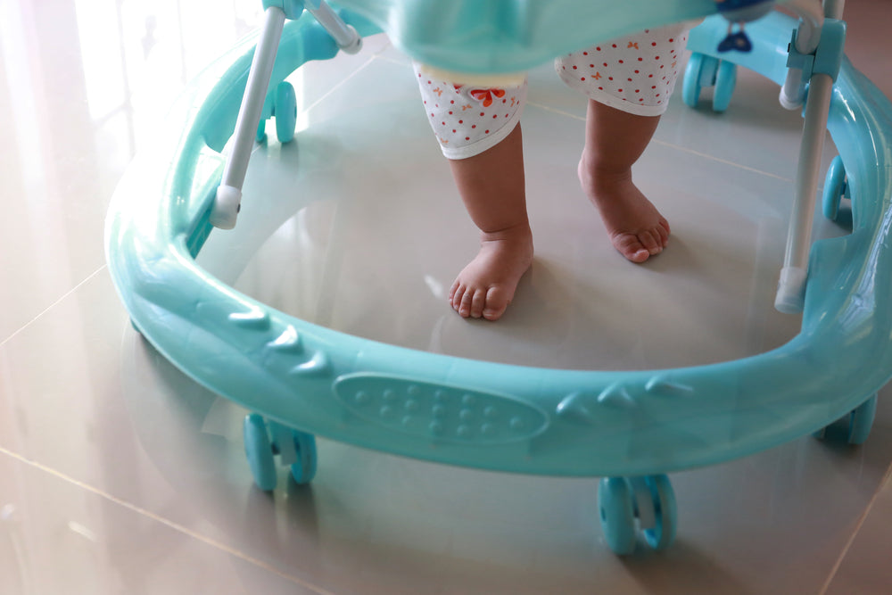 Baby in walker | Nourish Baby