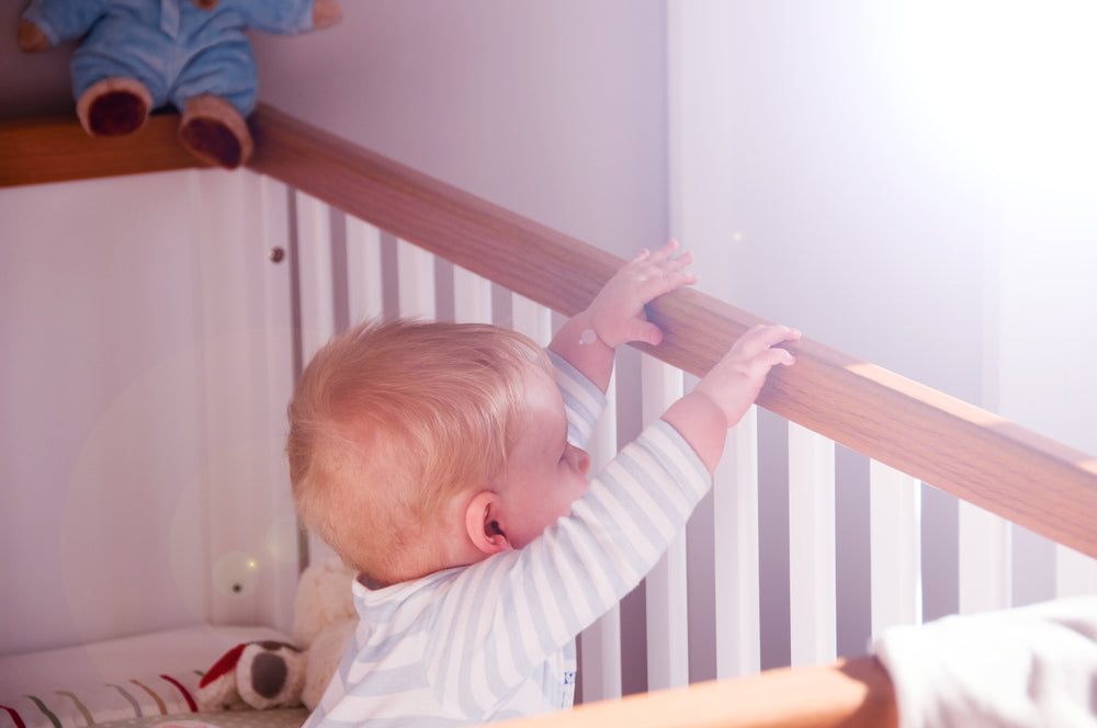 child in cot